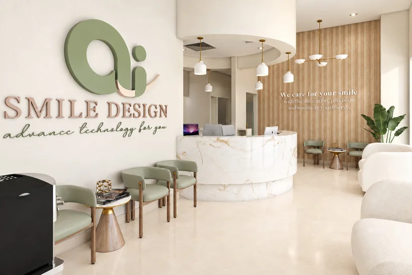 Ai Smile Design — Reception with a curved marble-look desk, sage-green chairs and a wood-slat wall reading “We care for your smile”