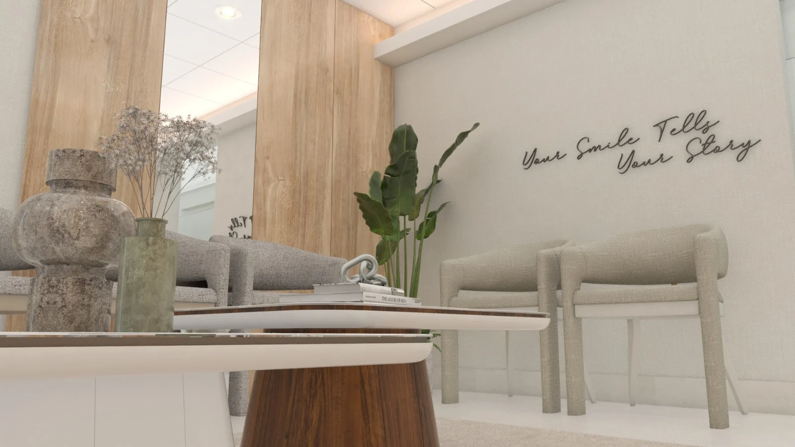 Allshine Dental Care — Low view past a coffee table with stone-look vases toward beige chairs and the script wall lettering