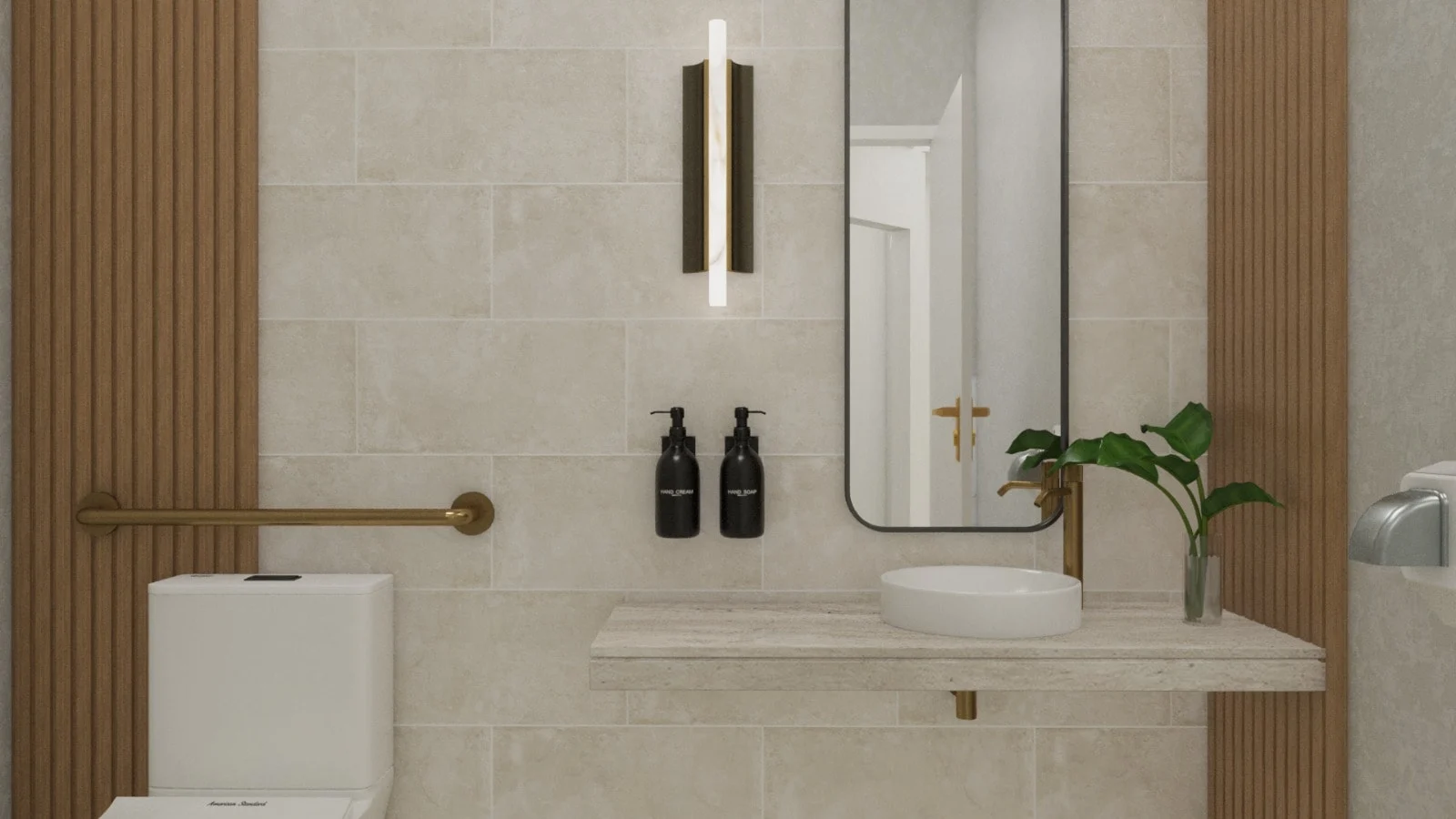 Bello-Burgos Smiles — Restroom with a round white vessel sink on a stone-look shelf, brass-toned faucet and grab bar