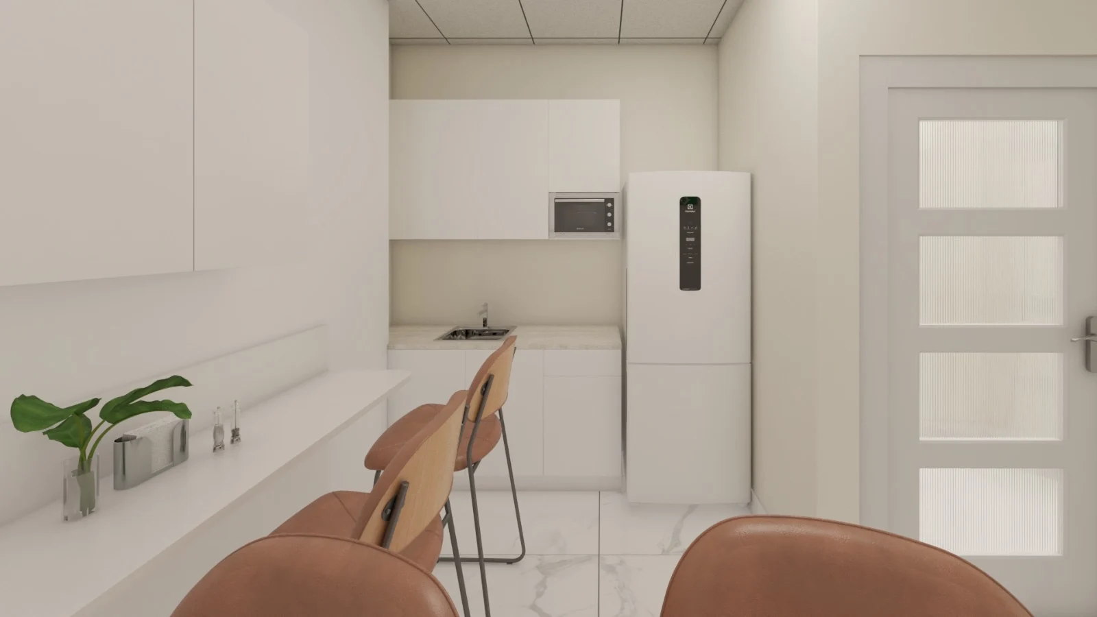 Dental American Group — Kitchenette with white cabinets, a refrigerator and tan leather stools along a wall counter
