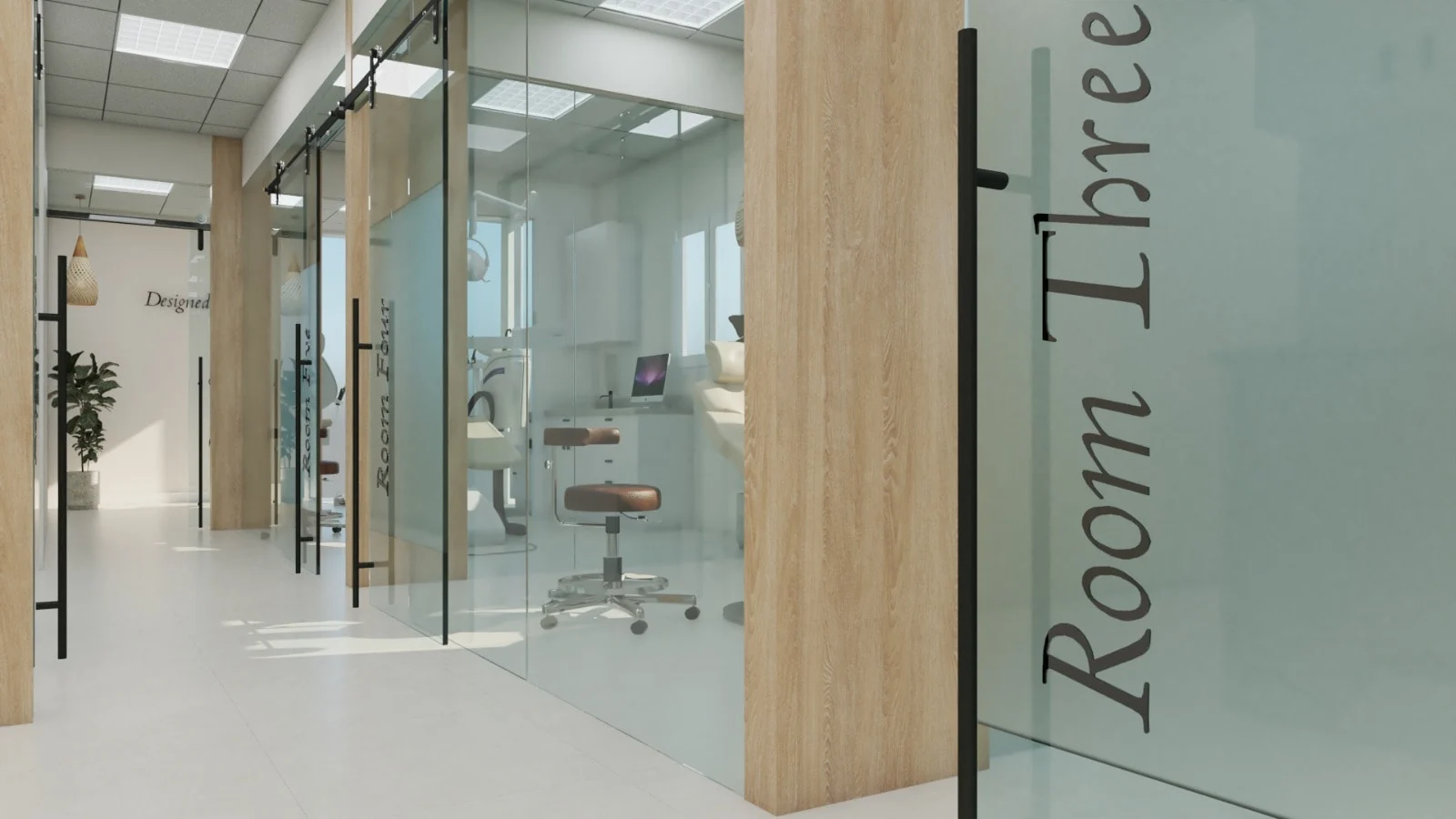 Habana Dental Care — Close-up of a frosted glass door lettered “Room Three”, with more treatment rooms along the corridor