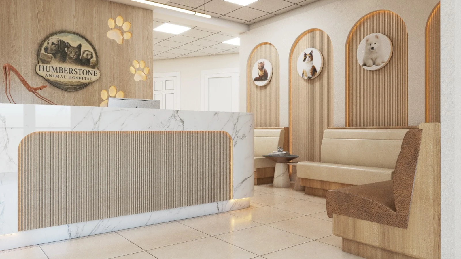 Humberstone Animal Hospital — Reception desk seen at an angle, with backlit paw prints and arched pet portraits beyond