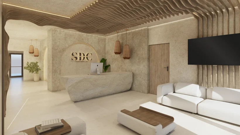 SDC — Smile Dental Center — Reception with a faceted stone-look desk under a wavy wood-slat ceiling and woven pendant lamps