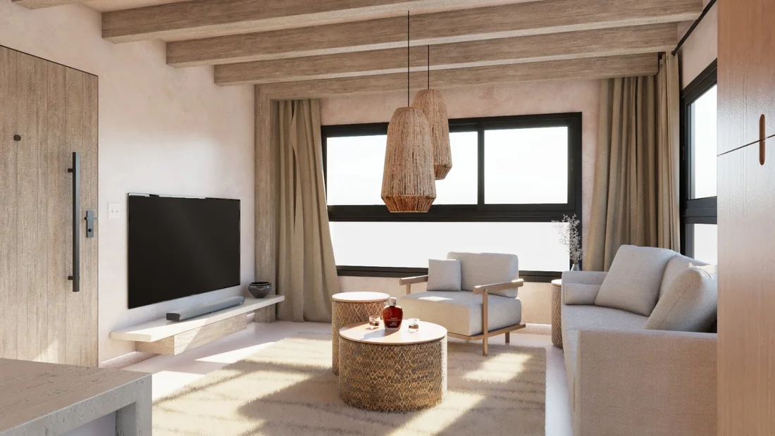 Villa Colibrí — Living room with wood ceiling beams, woven rope pendants and a light gray sofa facing a wall-mounted TV